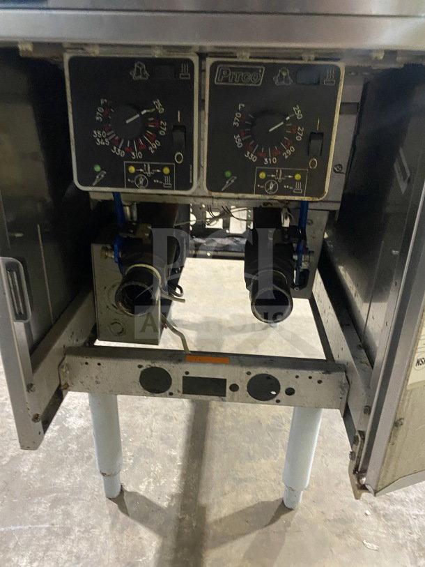 Pitco SE14T commercial stainless steel deep fat fryer with backsplash, basket hanger, and new fry basket; individual controls visible.