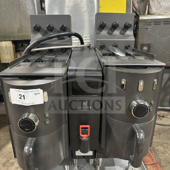 Clover CM9700 Vertica Series commercial coffee brewer with 6 flavor hoppers, on legs, 208V, model SN: E311353, good condition.