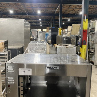 Vulcan stainless steel countertop cheese melter, electric powered, commercial use, model in good condition, visible Vulcan logo.