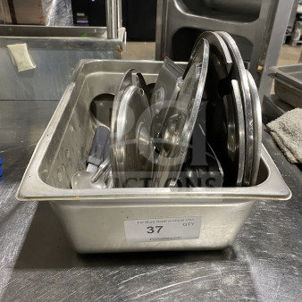 Commercial stainless steel full-size steam table pan with lids, ladle, and ice cream scoop. Good condition. Lot number 37.