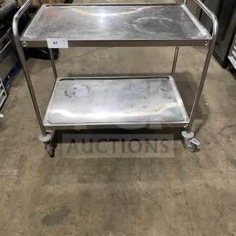 Commercial stainless steel 2-shelf utility cart with casters, in used condition. Includes visible tag "41 QTY".
