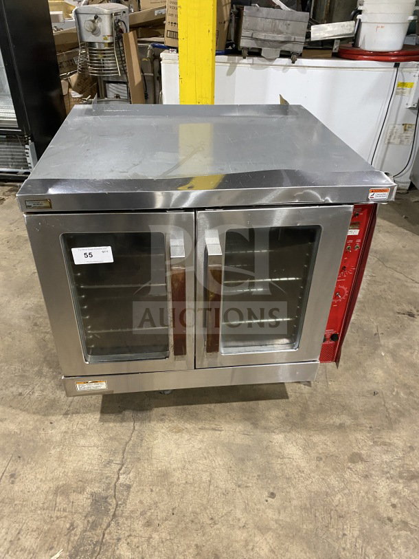Commercial stainless steel convection oven with double glass front doors. Good condition, visible control panel on the right.