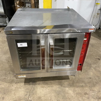 Commercial stainless steel convection oven with double glass front doors. Good condition, visible control panel on the right.