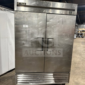True TS-49F stainless steel 2-door reach-in freezer, poly coated wire racks, on casters, Model SN: 1-4241472, 115V, 1 Phase.