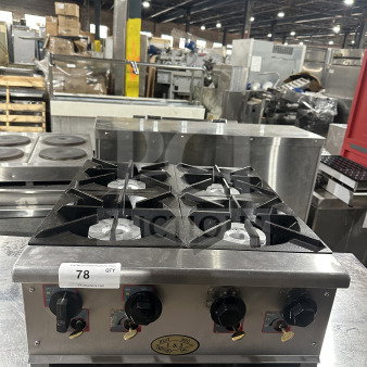 L&J Bunn stainless steel 4-burner countertop hot plate, gas powered, commercial use, with control knobs, good condition.