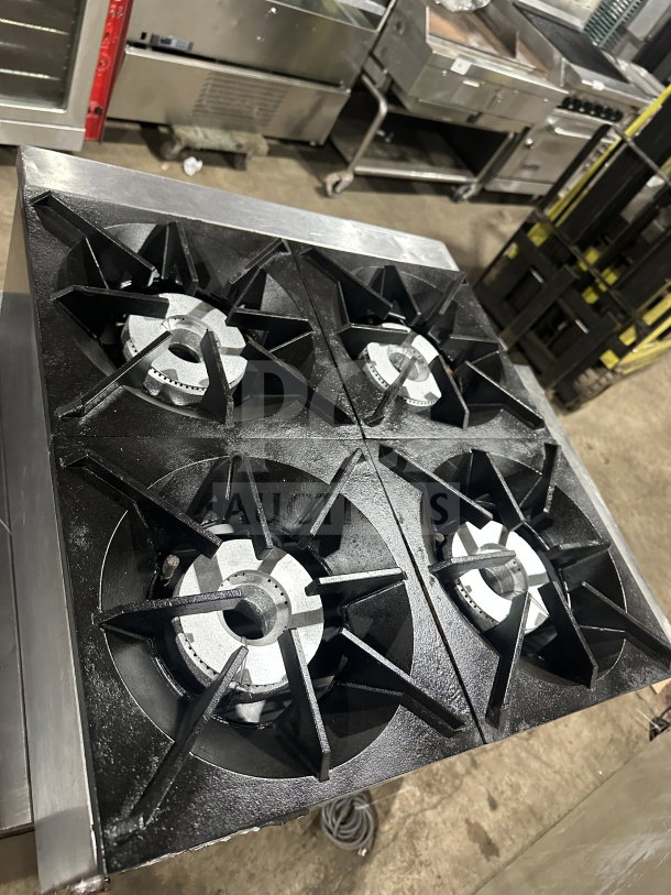 L&J Bunn 4-burner gas countertop hot plate, commercial-grade stainless steel, excellent condition, sturdy cast iron grates.