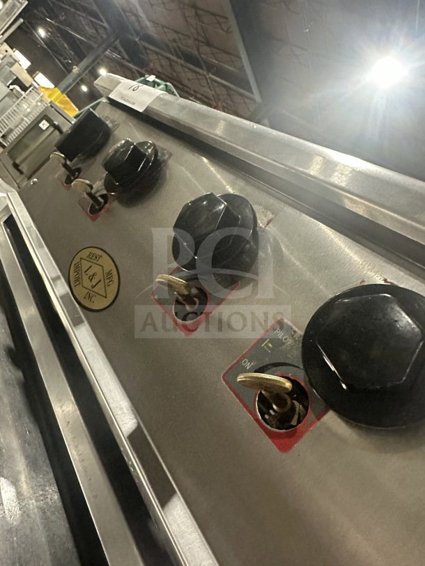 L&J Bunn stainless steel 4-burner gas countertop hot plate, commercial, controls visible, in good condition.
