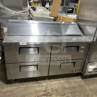 True TSSU-60-16D-4 4-drawer stainless steel refrigerated prep table, 60", with cutting board, on casters, Model SN: 8898970.