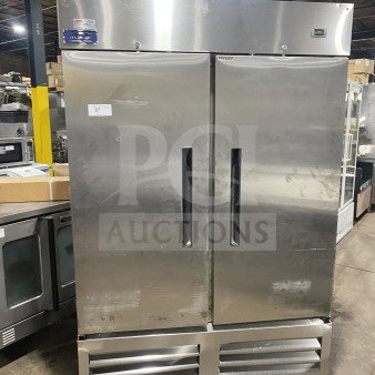 Arctic Air AF49EX stainless steel 2-door reach-in freezer, poly coated wired rack, 115V, on casters, serial H20093514.