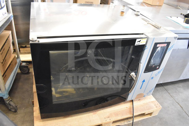 Brand new Blodgett KPE-gas 2.06/BCT 62 commercial combi convection oven, natural gas, scratch and dent, on pallet.