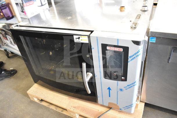 Brand new Blodgett KPE-gas 2.06/BCT 62 commercial combi convection oven; natural gas powered; minor scratches visible.