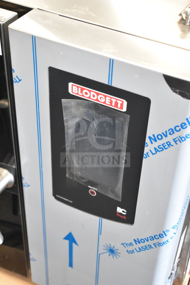 BRAND NEW Blodgett KPE-gas 2.06/BCT 62 commercial gas convection oven; scratch and dent. Novacel protective covering visible.
