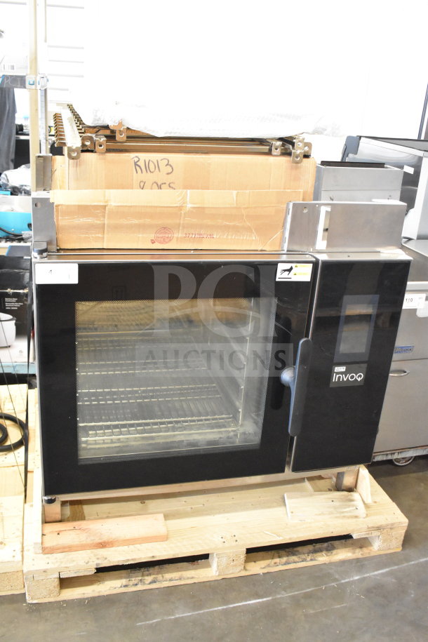 BRAND NEW Blodgett Invoq Commercial Combi Convection Oven, scratch and dent condition, visible labels on door, on a pallet.