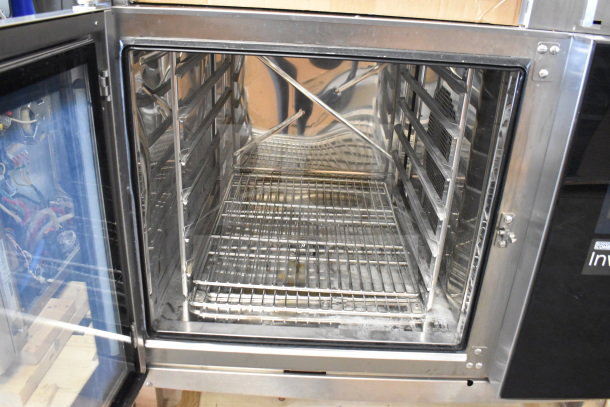 BRAND NEW Blodgett Invoq Commercial Combi Convection Oven, scratch and dent condition, interior shelving visible.