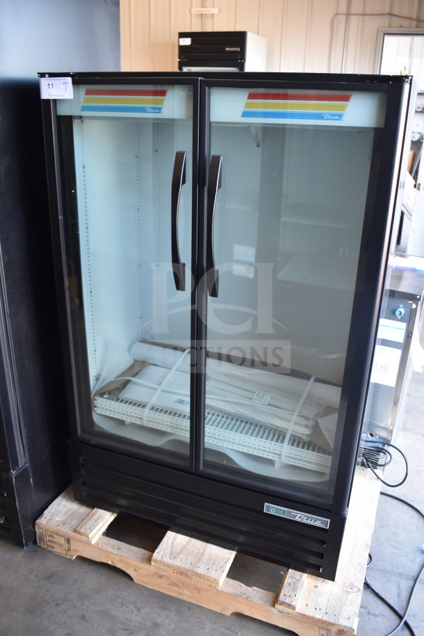 Brand new True TVM-36SL-HC commercial 2-door reach-in cooler merchandiser, 115V, 1 phase, minor scratches and dents.