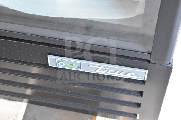 Brand new 2026 True TVM-36SL-HC cooler with natural refrigerant logo, 115V, 1 phase, minor scratches.