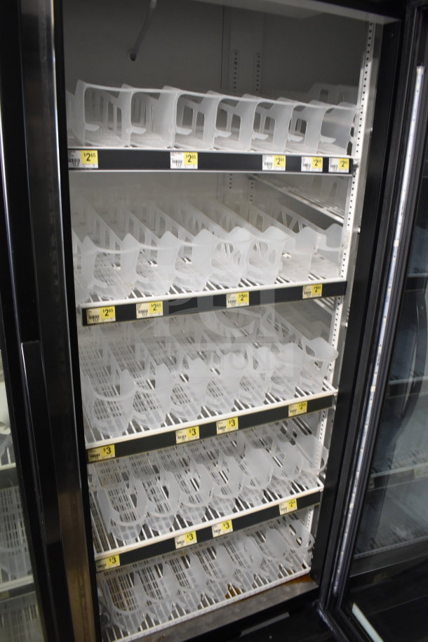 2018 True GDM-72-HC commercial 3 door cooler. Features transparent doors, adjustable shelving. Excellent condition. 115V, 1 phase.