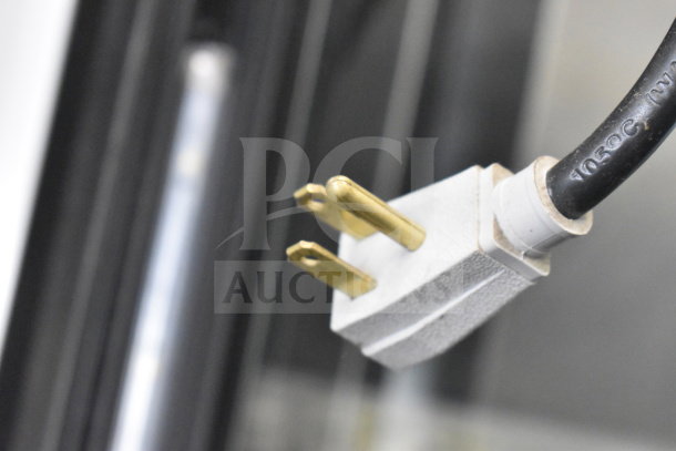 Close-up of a power plug from a 2018 True GDM-49-HC Commercial Cooler, 115 Volts, 1 Phase.