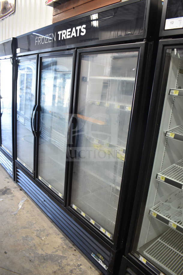 2018 True GDM-72F-HC 3 Door Reach-In Freezer Merchandiser, black, glass doors, used condition.
