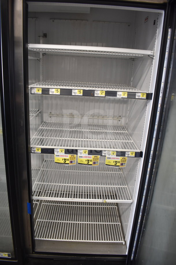 2018 True GDM-72F-HC commercial 3-door freezer, clean light interior, visible shelving, 115/208-230V, 1-phase.
