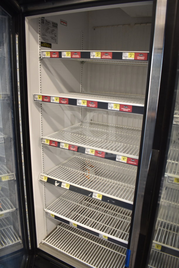 2018 True GDM-72F-HC commercial freezer, 3 doors, shelves, voltage 115/208-230, clean, good condition, visible labels.