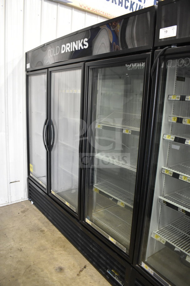 2018 True GDM-72-HC 3 Door Commercial Cooler, black, 115/208-230V, 1 phase, shelves inside, excellent condition.