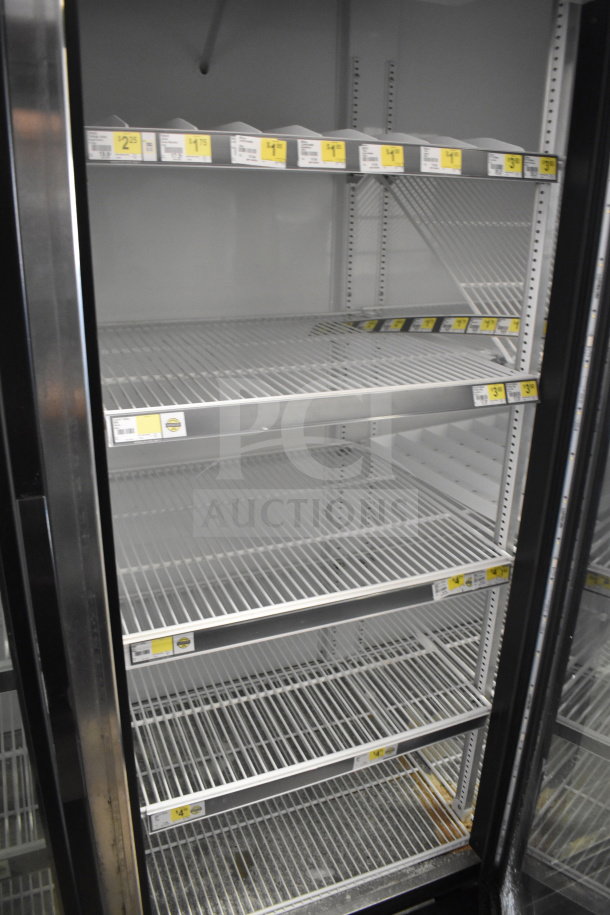 2018 True GDM-72-HC commercial cooler with 3 glass doors. Features adjustable shelves. 115/208-230V, 1 Phase.