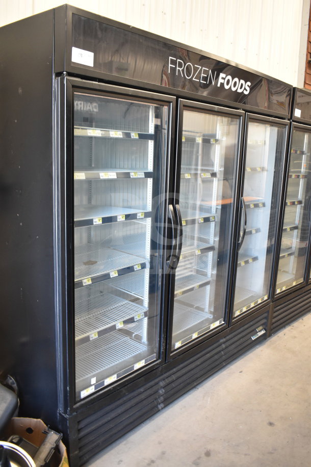 2018 True GDM-72F-HC 3-door reach-in freezer, black frame, glass doors, commercial use, 115 volts, 1 phase.