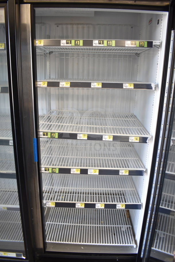 2018 True GDM-72F-HC three-door freezer merchandiser, 115 volts, 1 phase, with adjustable shelves, excellent condition.