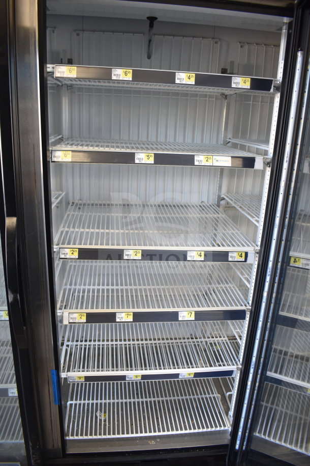 2018 True GDM-72F-HC commercial 3-door reach-in freezer, 115V, 1-phase, excellent condition, spacious shelving, ideal for merchandising.