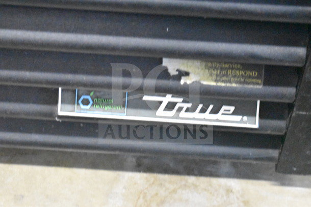 2018 True GDM-72-HC Commercial 3 Door Cooler, 115V, 1 Phase, with natural refrigerant label, used condition.