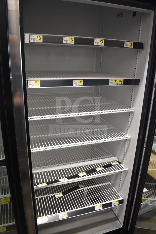 2018 True GDM-72-HC commercial 3-door reach-in cooler, with white wire shelves, 115 volts, 1 phase. Good condition.