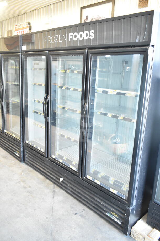 2018 True GDM-72F-HC commercial 3-door reach-in freezer merchandiser, black, glass doors, 115/208-230V, 1 phase.