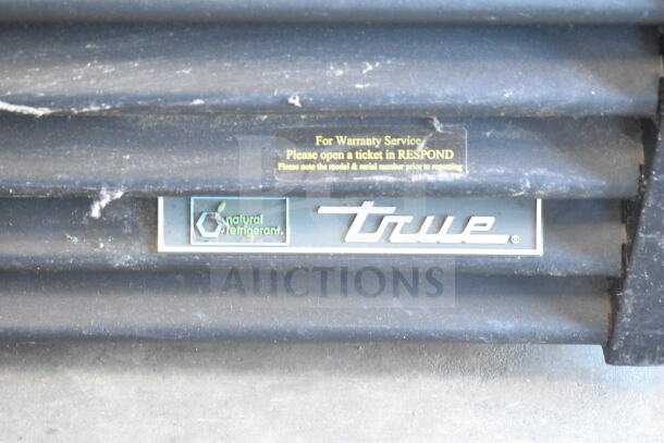2018 True GDM-72F-HC Freezer Merchandiser label, features natural refrigerant. 115/208-230V, 1 Phase. Warranty info visible.