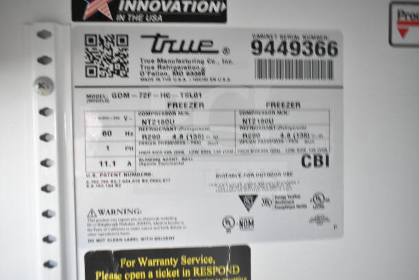 2018 True GDM-72F-HC commercial freezer label, model and voltage details, excellent condition.