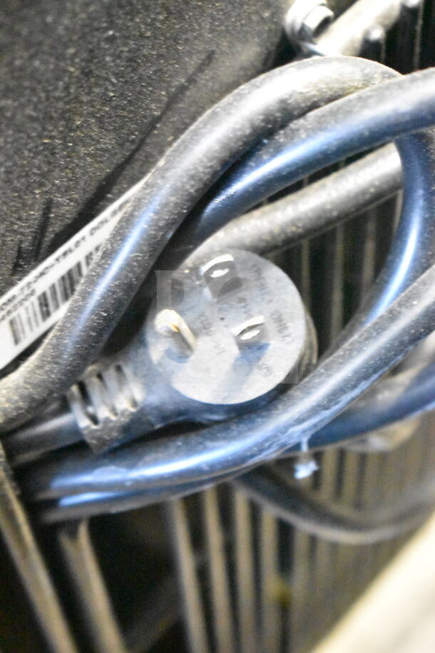 Close-up of the plug and power cord for a 2018 True GDM-72-HC commercial cooler, showing a 115V, 1-phase connection.