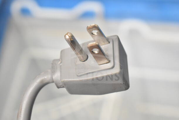 Commercial chest freezer plug, 115 volts, 1 phase, visible prongs, suitable for retail use.