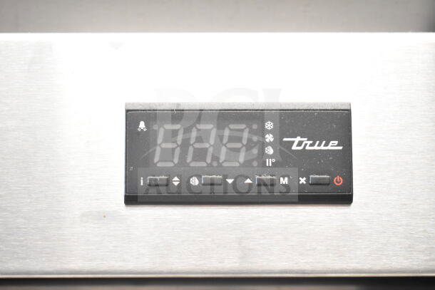 2019 True T-23F-HC freezer control panel, displaying temperature. Features branded logo and control buttons.