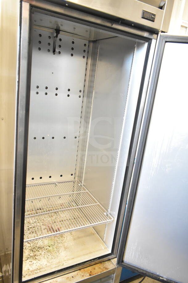 2019 True T-23F-HC commercial single door reach-in freezer, open door, interior view, 115V, 1 phase, stainless steel shelves.