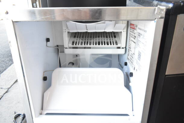 2025 Hoshizaki AM-50BAK ice machine, 27 lb. bin, clean interior view, model label visible, like new condition.