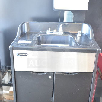 Ozark River Portable Sink on Commercial Casters.