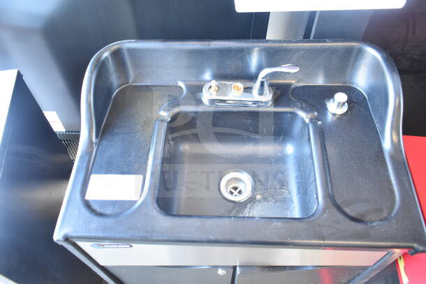Ozark River Portable Sink with faucet on commercial casters, black finish, stainless steel accents, includes push button.