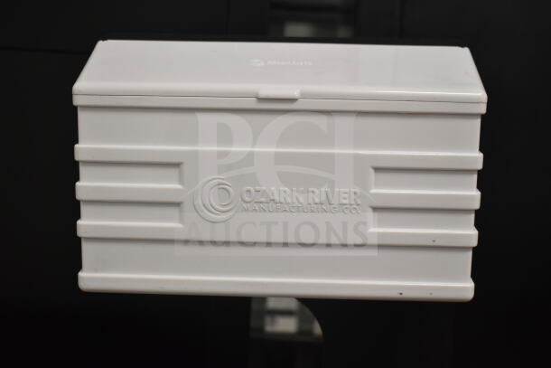 White Ozark River portable sink on commercial casters, embossed with "Ozark River Manufacturing Co." logo, in good condition.