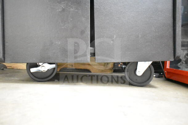 Ozark River portable sink with commercial casters, black finish, visible sturdy wheels, ideal for mobility.