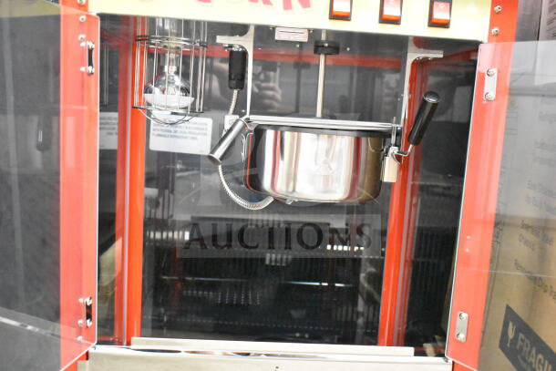 Carnival King PM30R 8 oz. Red Commercial Popcorn Machine, new scratch and dent, 120V, 1 Phase, stainless steel details.