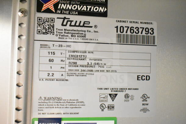 2023 True T-23-HC commercial cooler label showing model, voltage, refrigerant, and certifications. Serial number: 10763793.