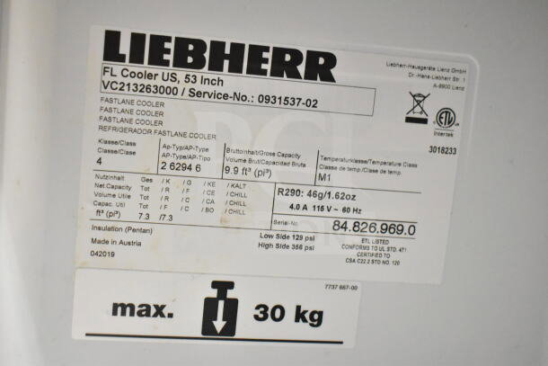 Liebherr VC213263000 cooler label, showing model, 9.9 ft³ capacity, R290 refrigerant, 115V, and serial number. Made in Austria.