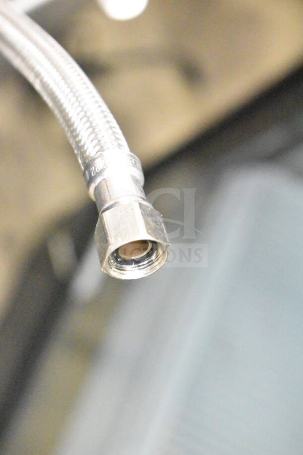 Close-up of the Hoshizaki KM-151BAH ice machine connector, showing its metallic finish and high-quality threading.