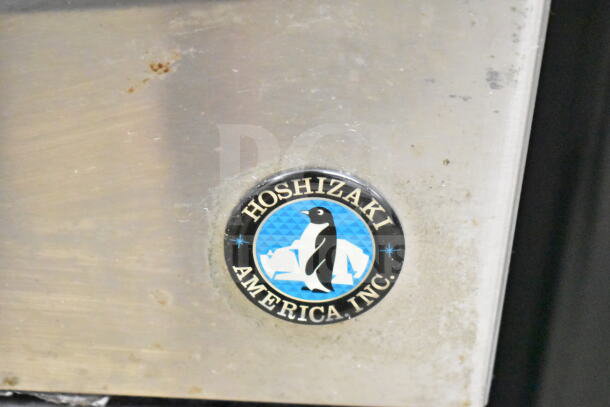 Hoshizaki KM-151BAH undercounter ice machine, stainless steel, visible brand logo, model labeled, 115V, used condition.