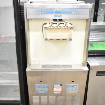 Taylor 754-33 commercial soft serve machine, floor style, water-cooled, 2 flavors with twist, on casters, 208-230V, 3 phase.